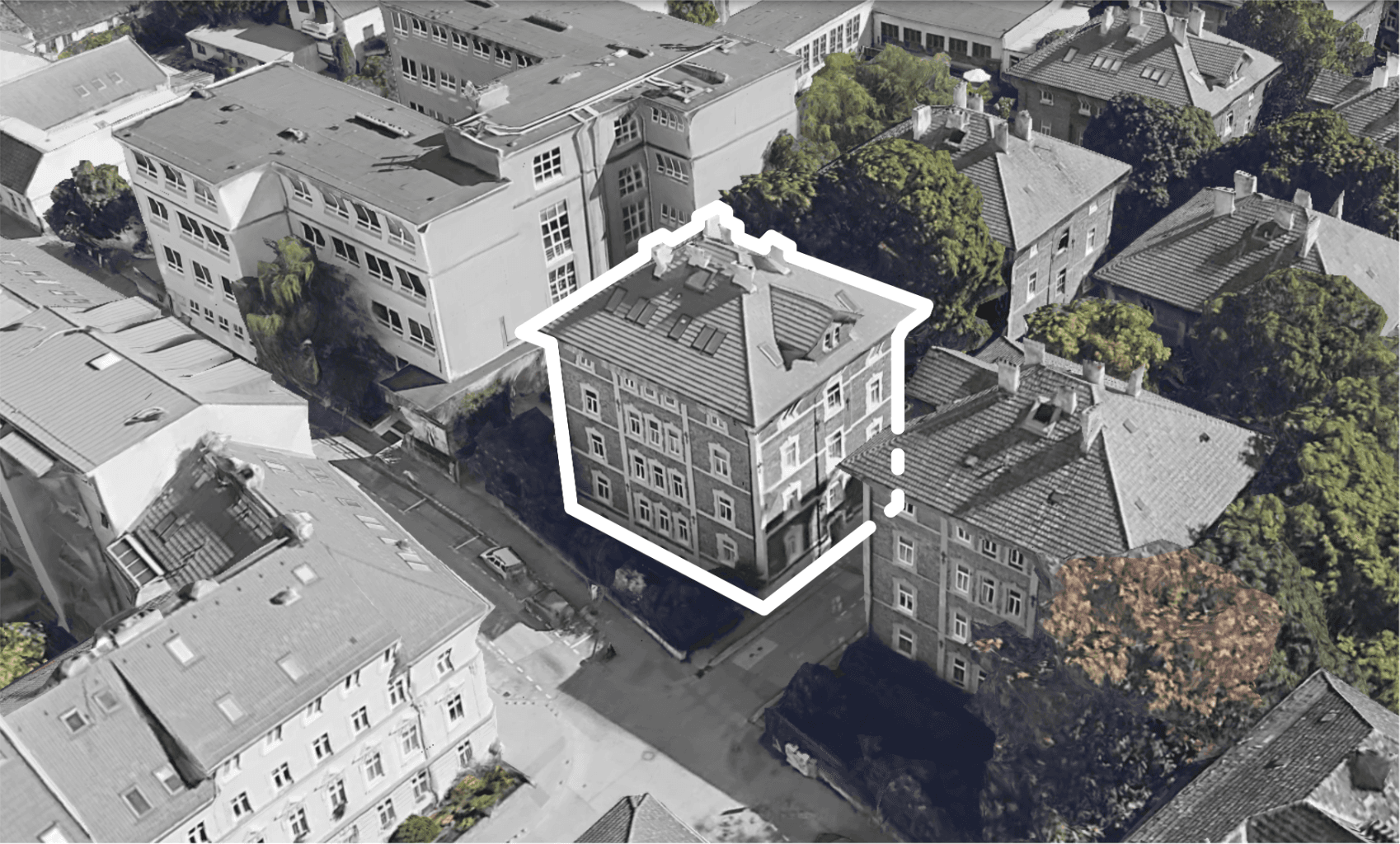 Aerial view of Palárikova 10 building highlighted in urban context